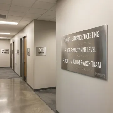 ADA-compliant signs in a commercial building