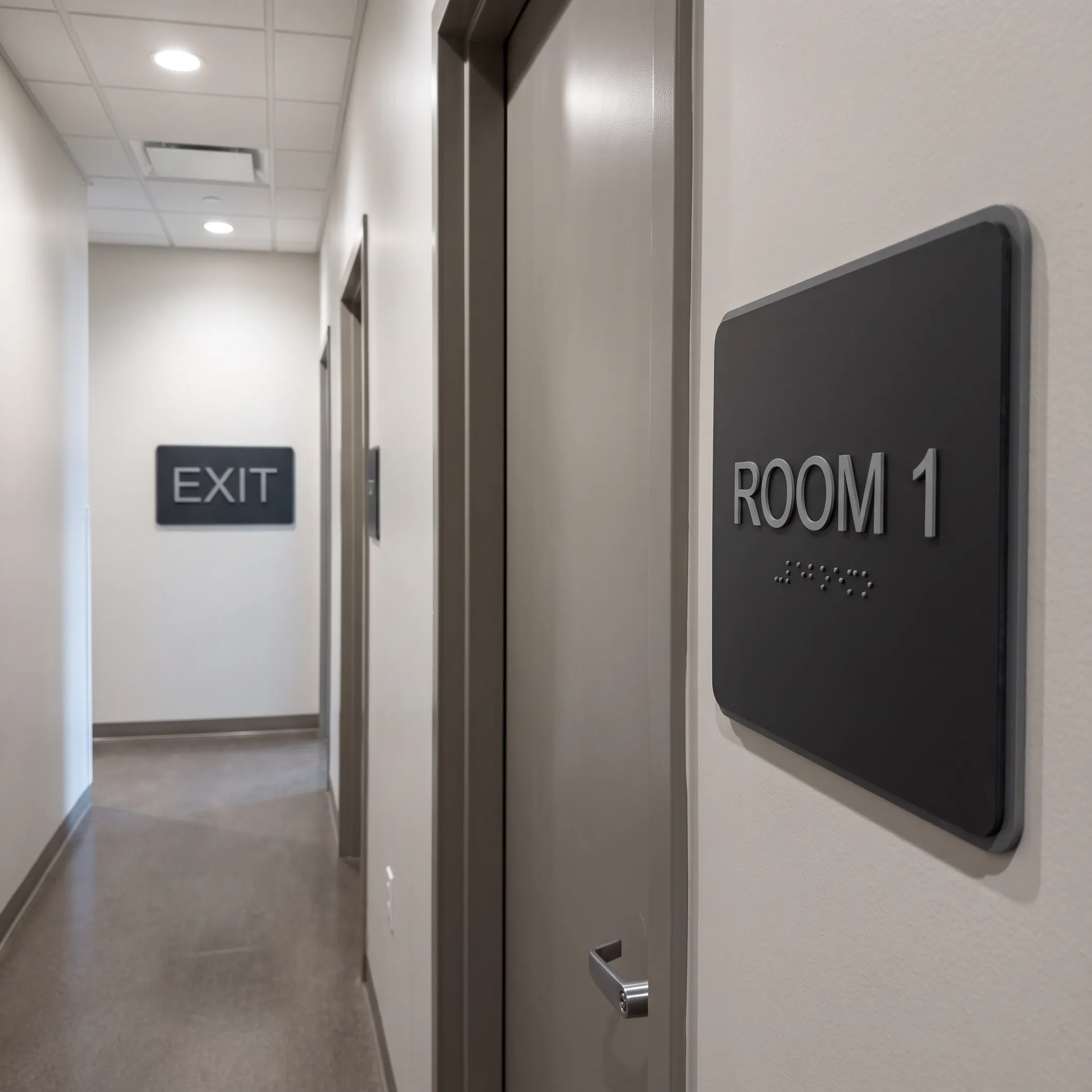 ADA-compliant Braille signage installed in an office