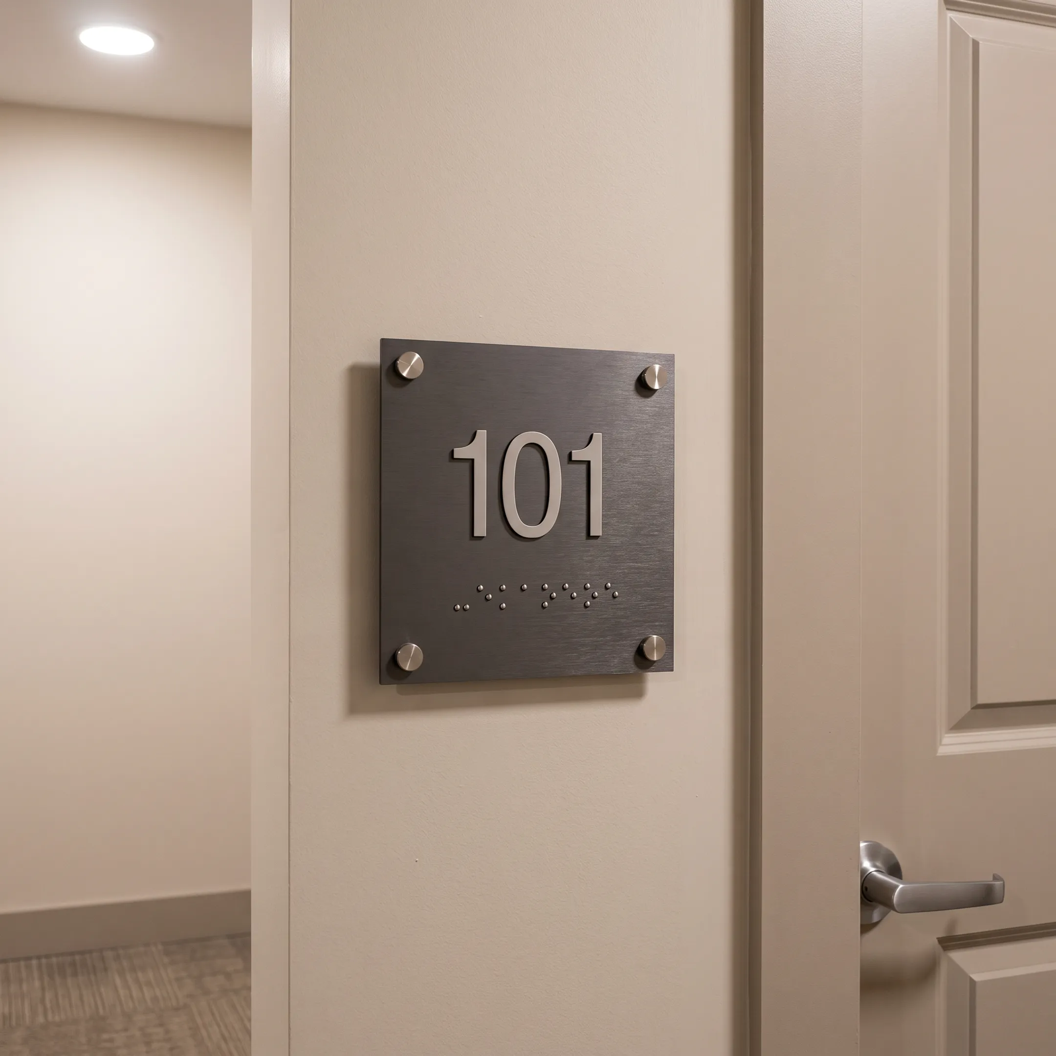 ADA apartment room identification sign with Braille