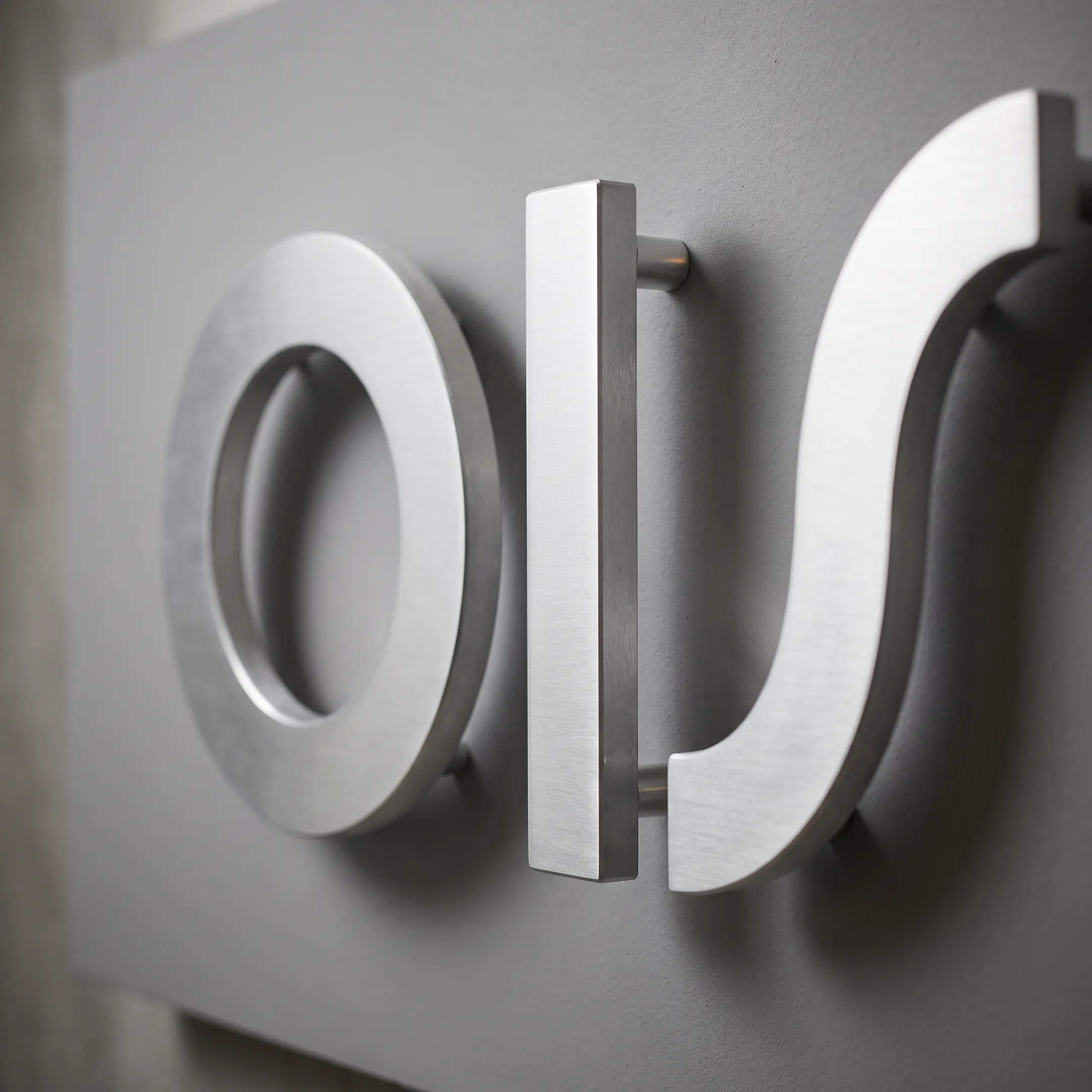 Dimensional raised letters on a commercial wall