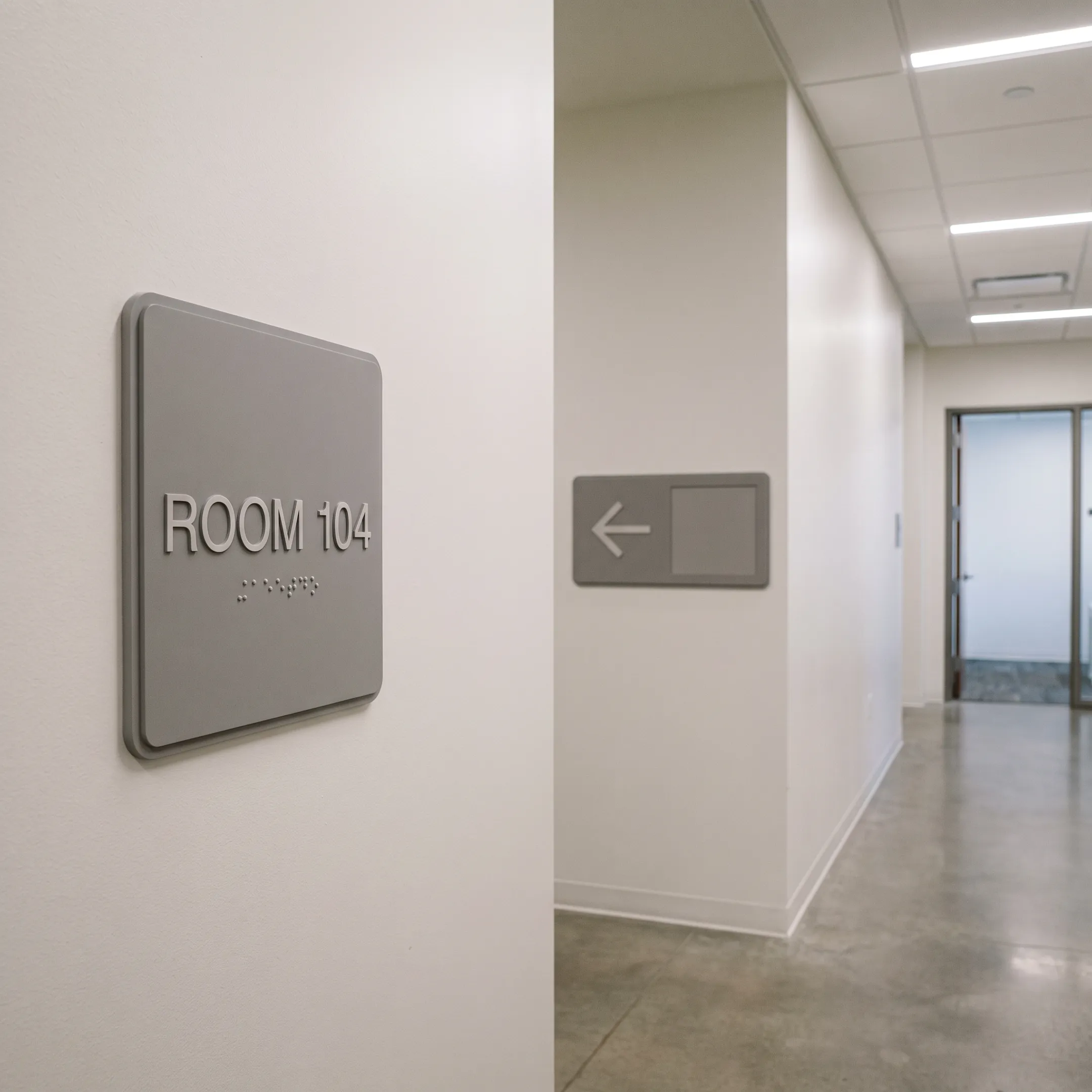 Tactile Braille signage installed in an office