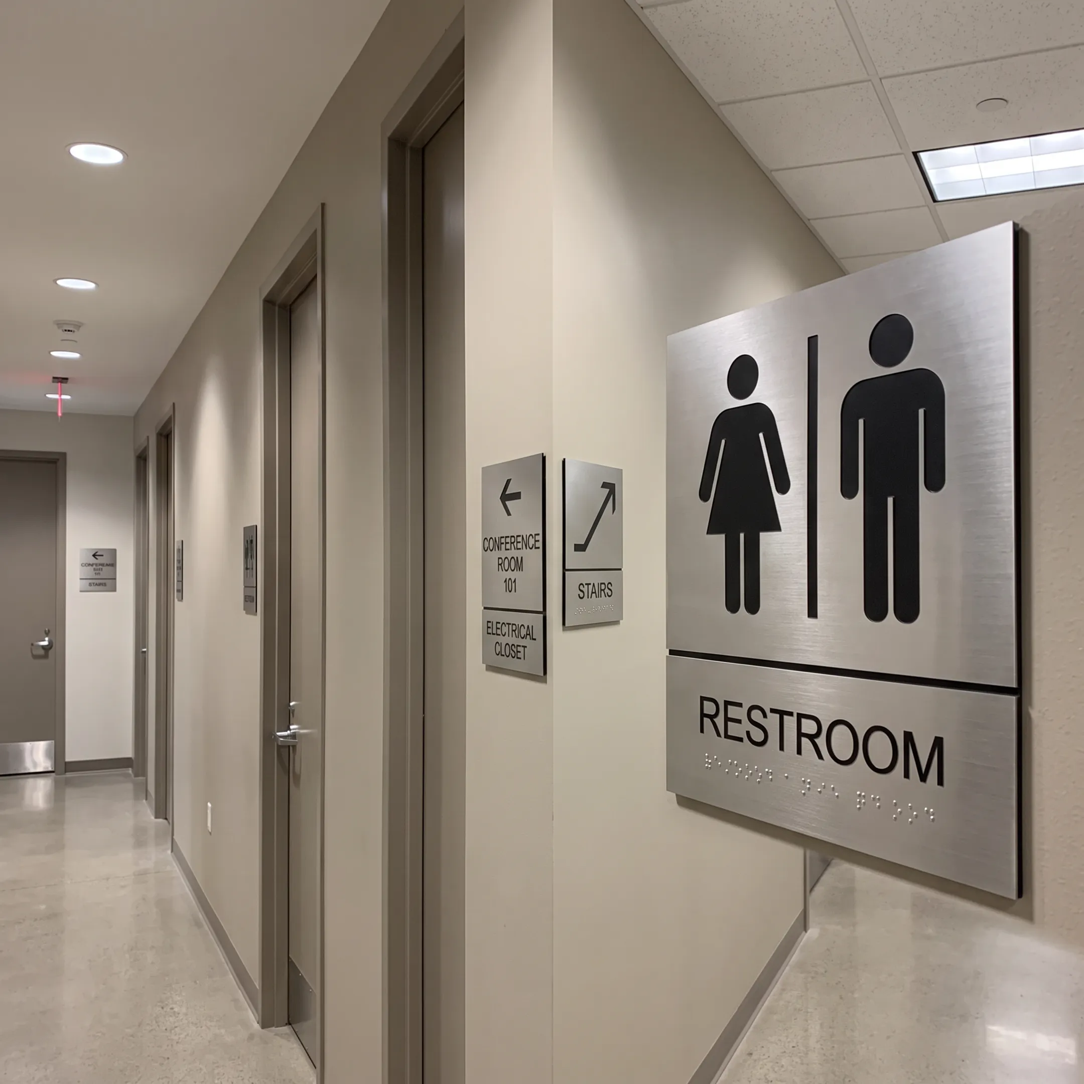 Architectural wayfinding and ADA wholesale signs in a facility