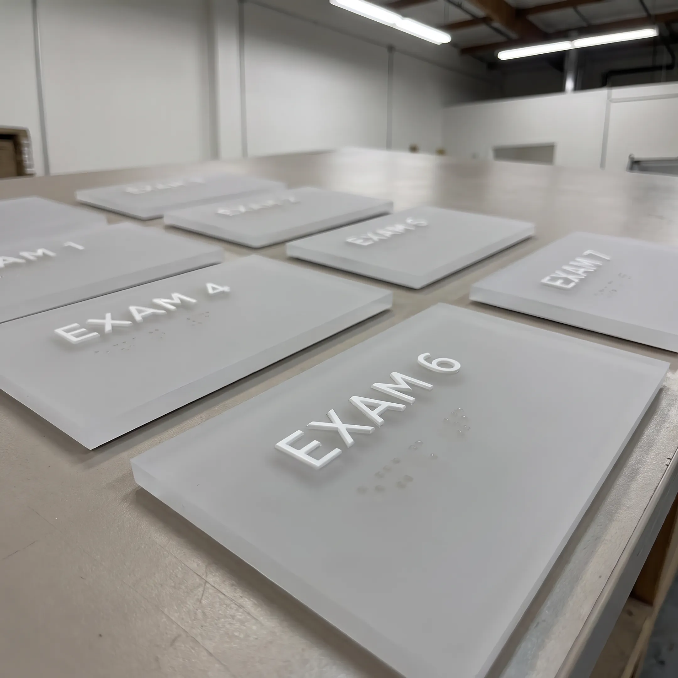 Wholesale ADA-compliant tactile and Braille signs manufactured for commercial facilities.