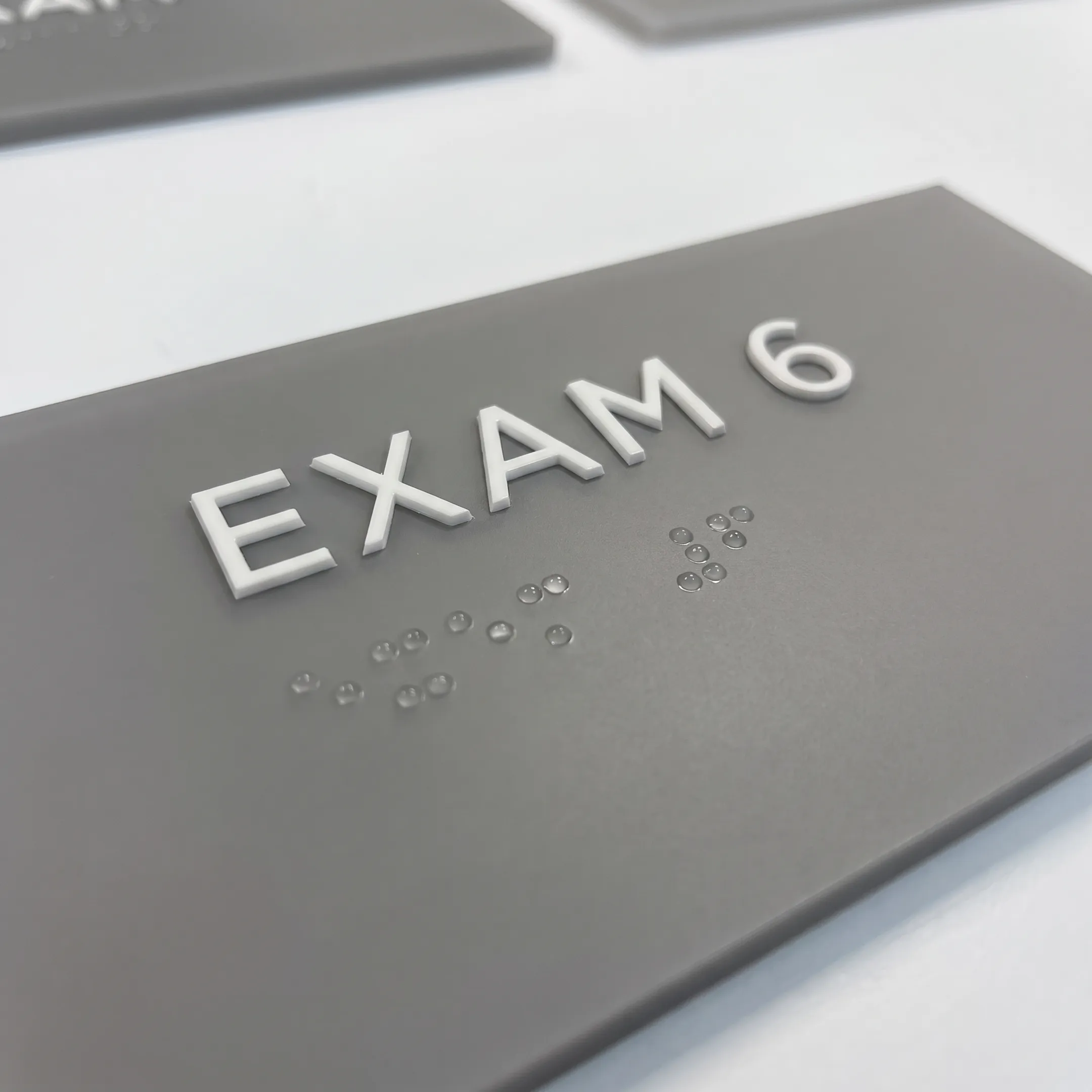 Finished tactile ADA sign meeting compliance standards
