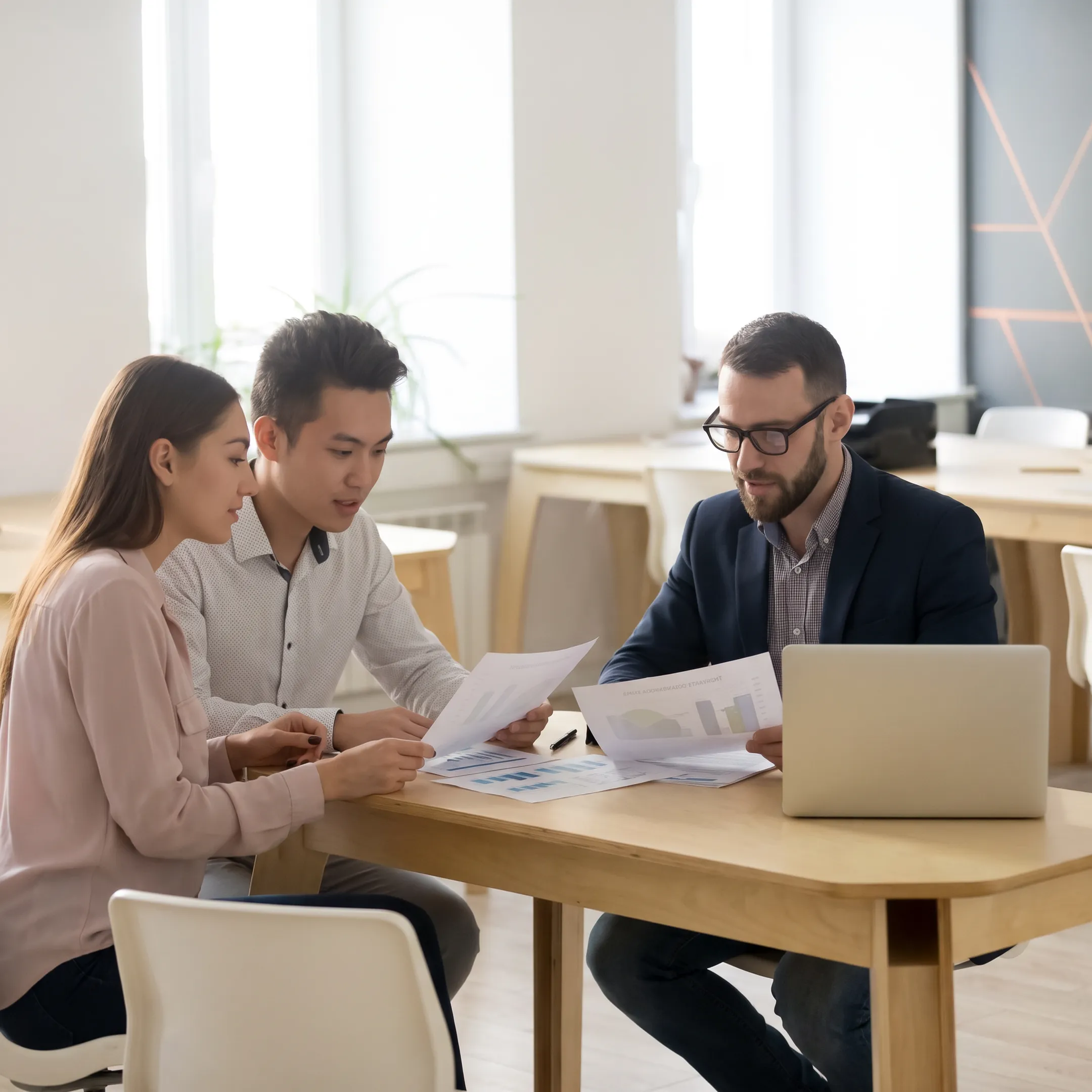 Real estate advisor reviewing market information with a homeowner