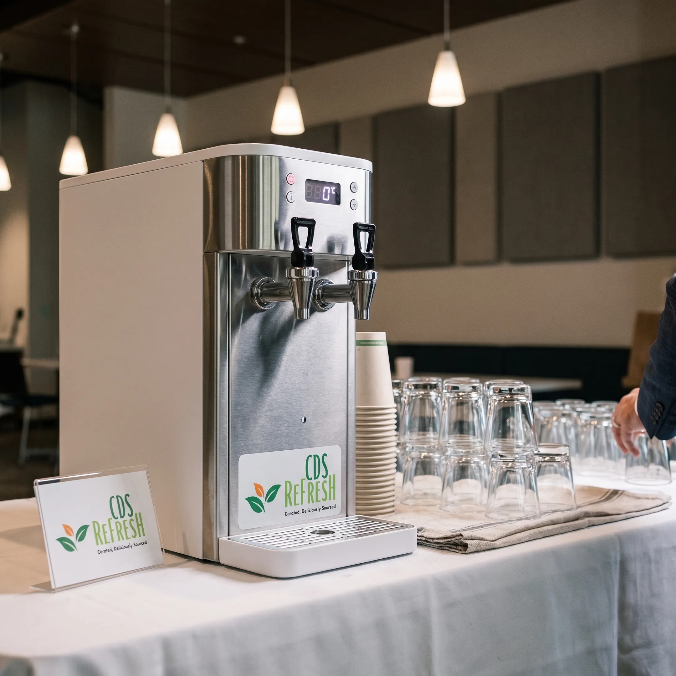 Filtered water dispenser at an event refreshment area