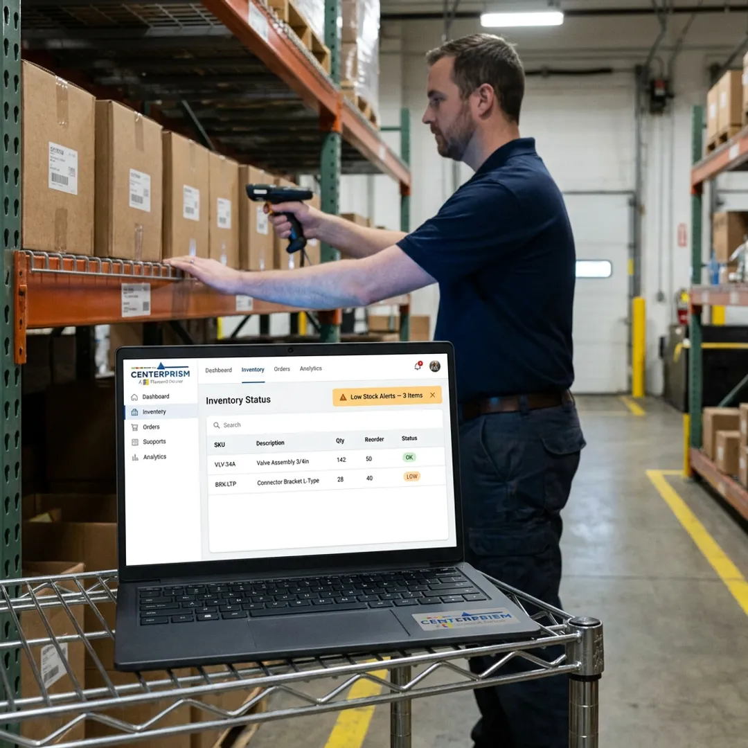 Warehouse worker scanning inventory with mobile device