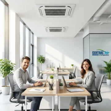 Modern commercial office space with efficient AC system and comfortable employees working