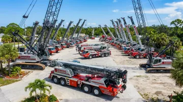 Sims Crane diverse fleet of all-terrain and crawler cranes on Florida job site