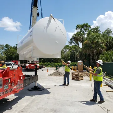 Crane lifting equipment on a Florida jobsite