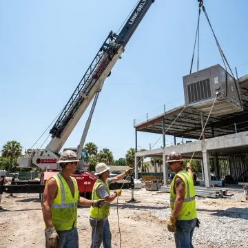 Crane lifting equipment at a Clearwater job site