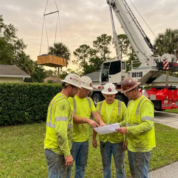 Crane crew preparing a residential lift