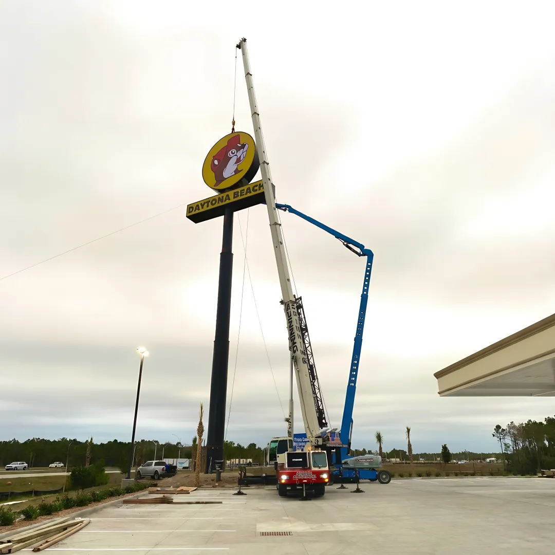 Crane operator preparing telecom rigging equipment