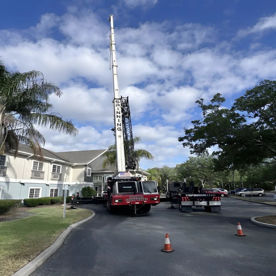 Crane lifting wind turbine component in Florida