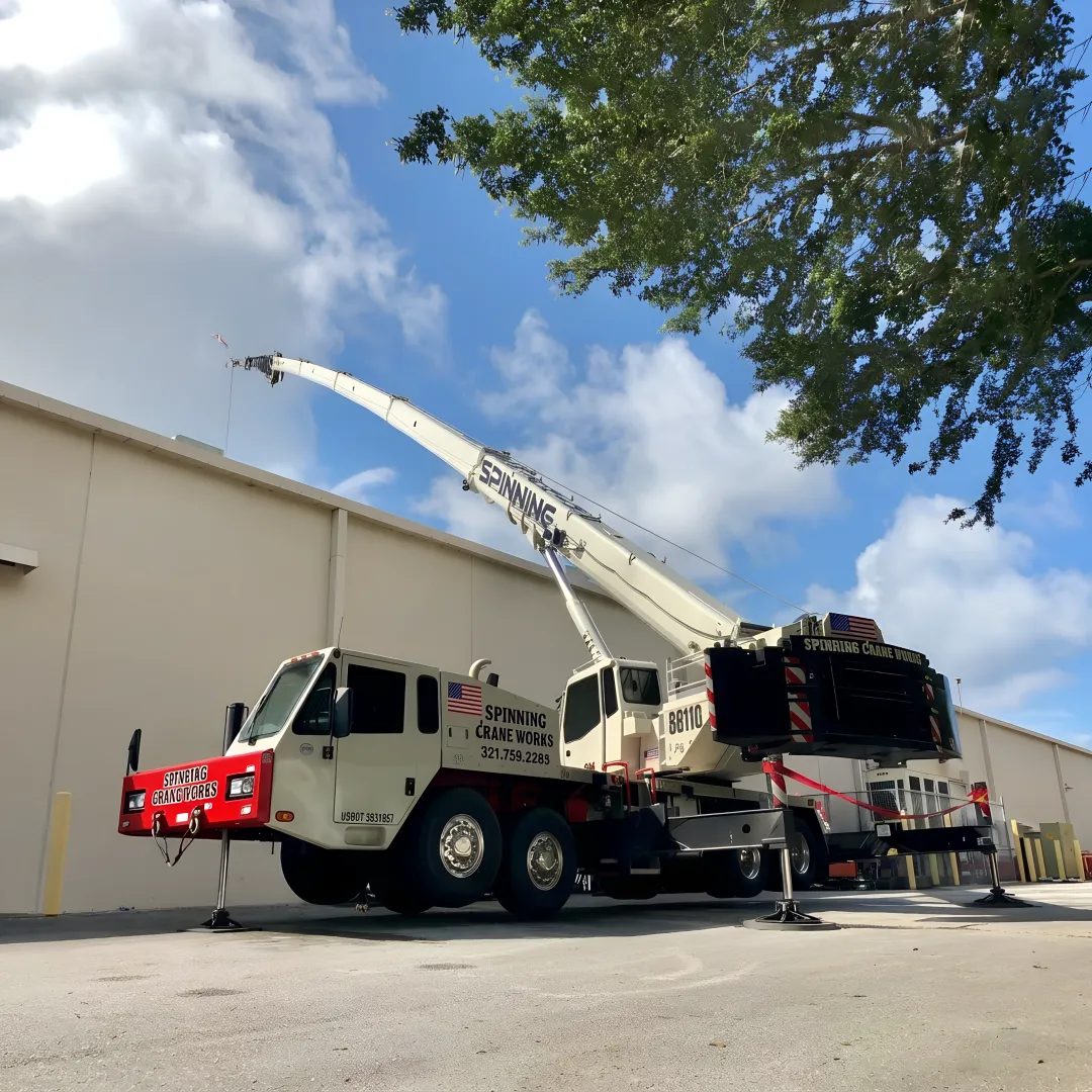 Crane lifting oversized machinery in Florida