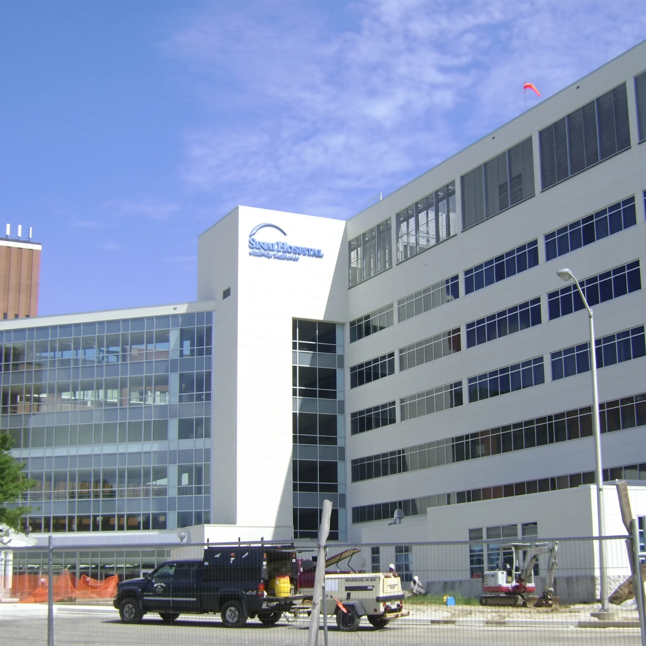 Completed commercial rainscreen stucco exterior with layered EIFS wall components