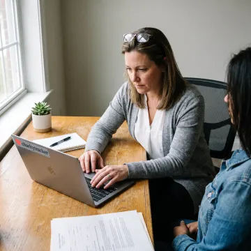 Caseworker using case management software