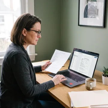Caseworker reviewing a secure digital intake assessment