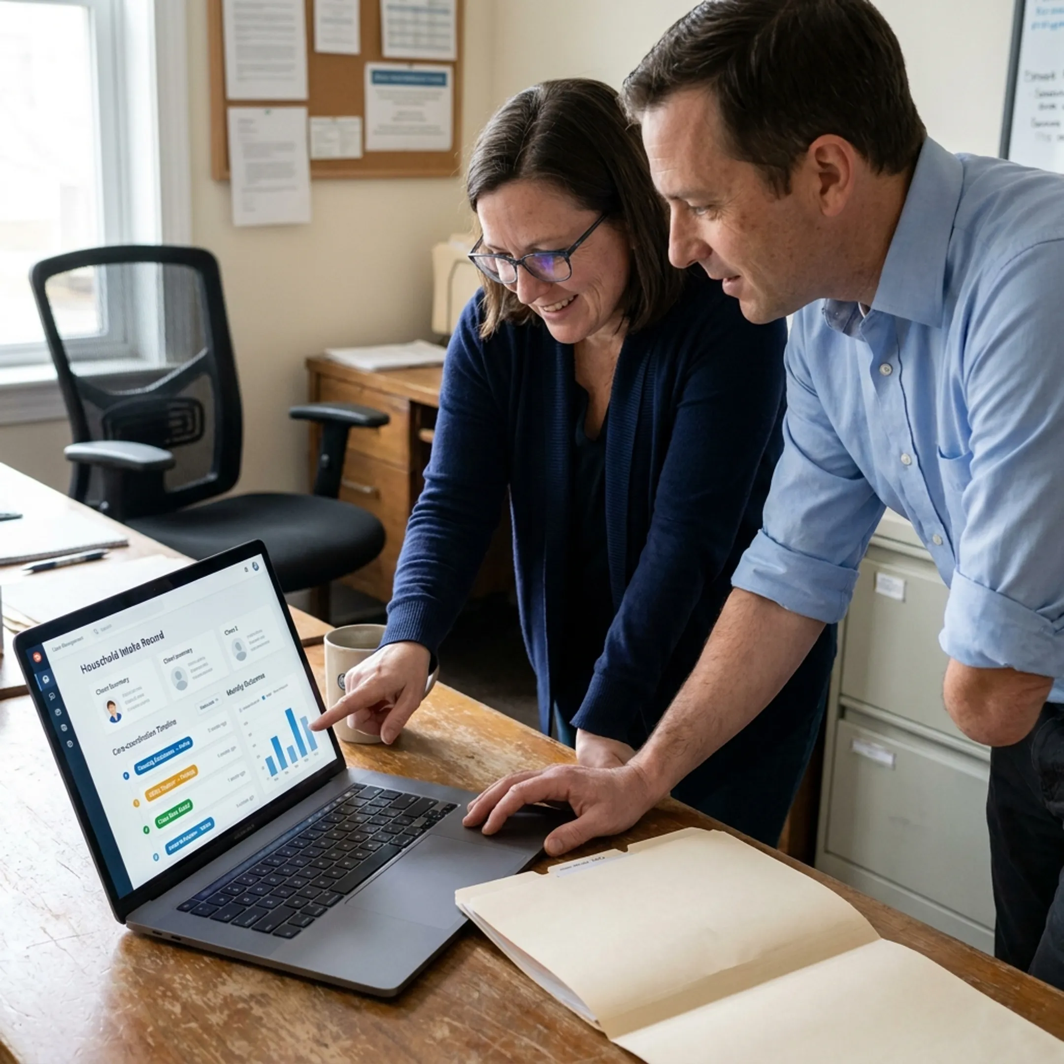 Community health team reviewing digital patient intake records