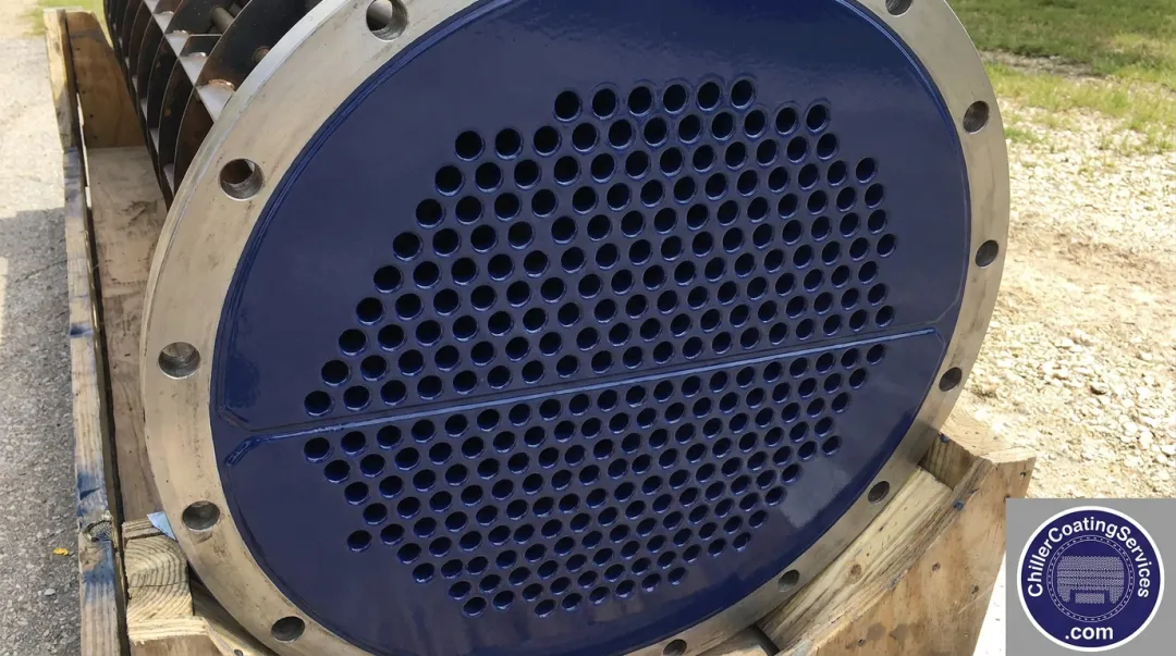 Chiller tube sheet with epoxy barrier coating applied after abrasive blasting surface preparation