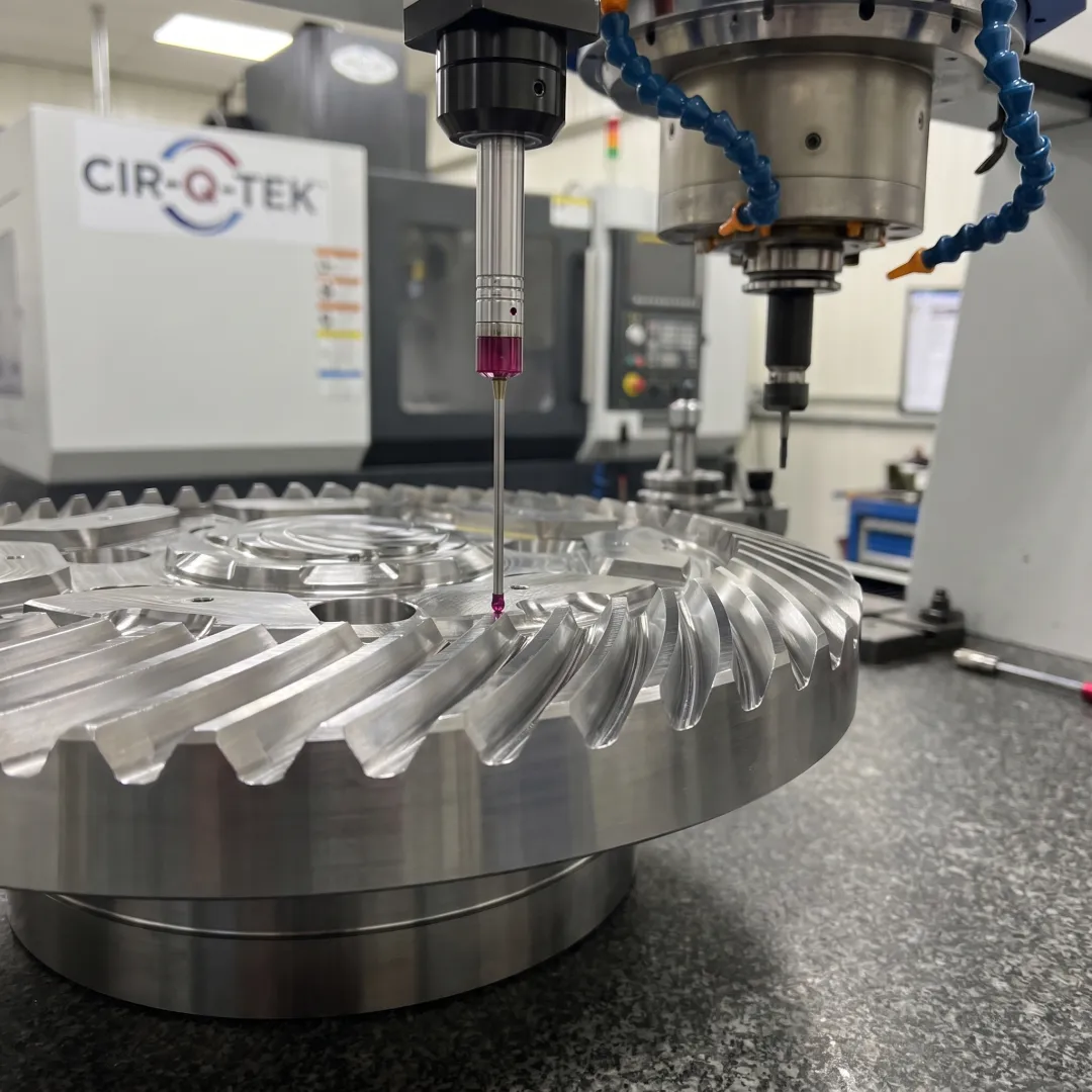 Precision-machined metal component under inspection