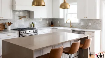 Midwest kitchen remodel featuring quartzite perimeter and quartz island countertops