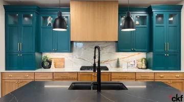 CKF kitchen design featuring gold cabinet hardware and matte black fixtures
