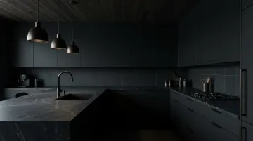 Moody all-black kitchen with soapstone countertops and matte charcoal backsplash tile