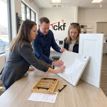 Designer reviewing cabinet and countertop samples