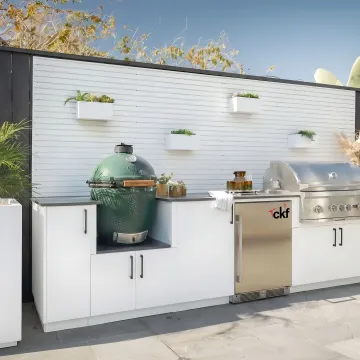 Outdoor living space with kitchen countertops and seating