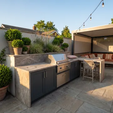 Outdoor living space with kitchen countertops and seating