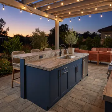 Elegant outdoor kitchen with stone countertops