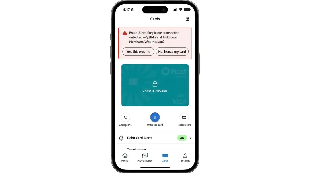 Mobile banking app fraud alert notification with card freeze option displayed