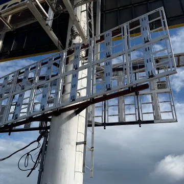 Technician calibrating an installed LED sign