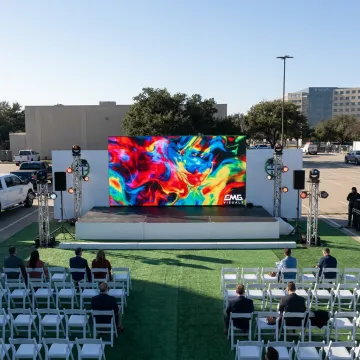 Outdoor LED screen displaying bright visuals
