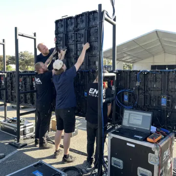 Technicians installing an outdoor LED screen