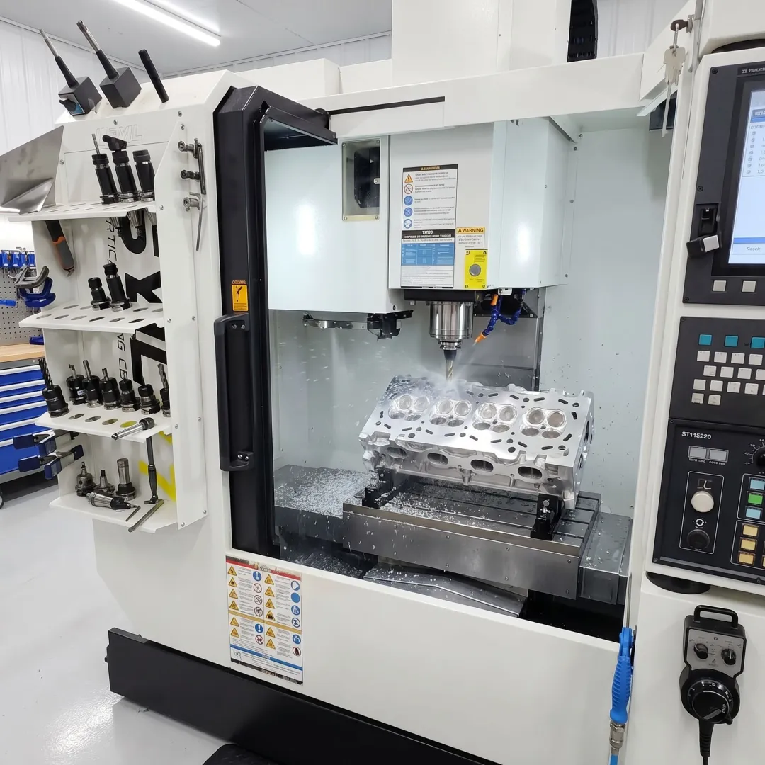 5 axis CNC machine porting a cylinder head