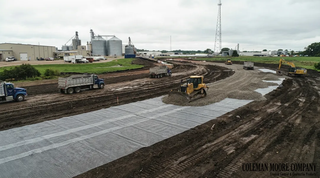 Tensar InterAx geogrid installation on soft subgrade at industrial site expansion project