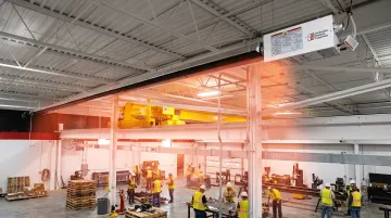 CRC Reflect-O-Ray infrared radiant tube heater installed in warehouse ceiling