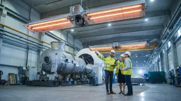 CRC Reflect-O-Ray infrared tube heater installed in commercial aircraft hangar