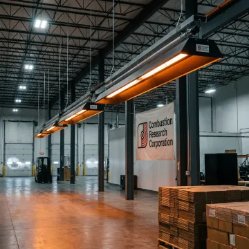 Radiant tube heater in industrial facility