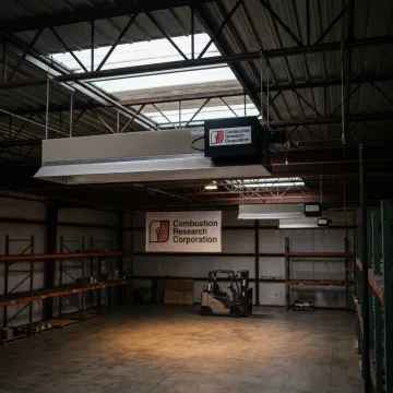 Radiant tube heater installed in industrial facility