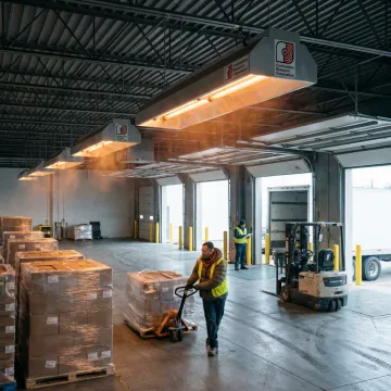 Infrared heaters warming an industrial loading dock