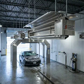 Commercial car wash bay with infrared heaters