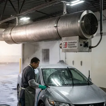 Infrared heater above a commercial car wash bay