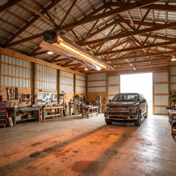 Radiant tube heater warming a pole barn workshop