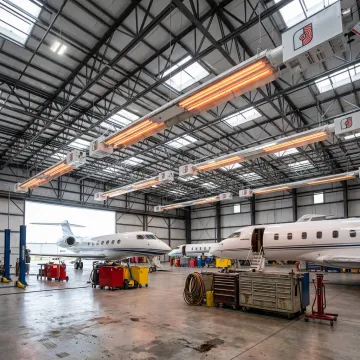 Aircraft hangar with radiant infrared heaters