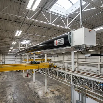 Gas infrared radiant tube heaters in industrial facility