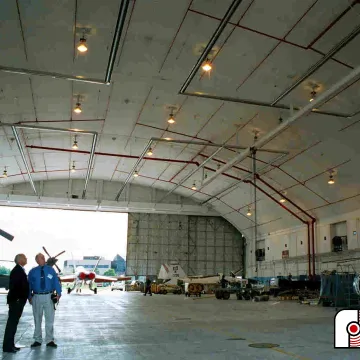 Engineer reviewing warehouse radiant heater layout