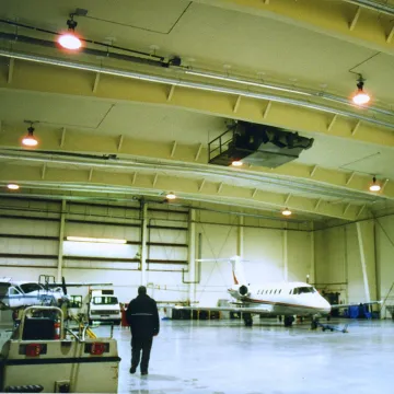 Radiant tube heaters installed in aircraft hangar